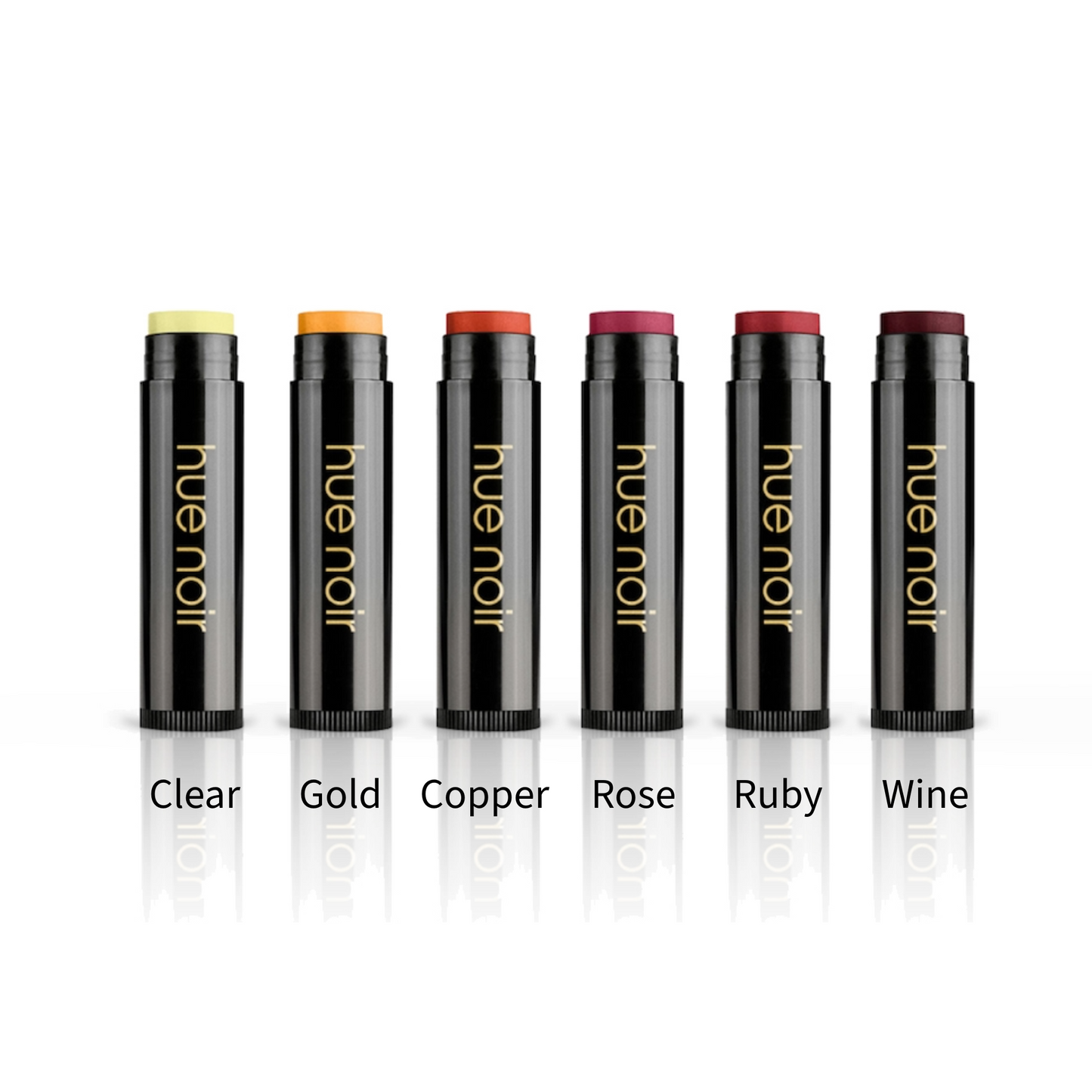 Six Hue Noir tinted lip balms on a white background in shades Copper, Ruby, Gold, Clear, Rose, and Wine.