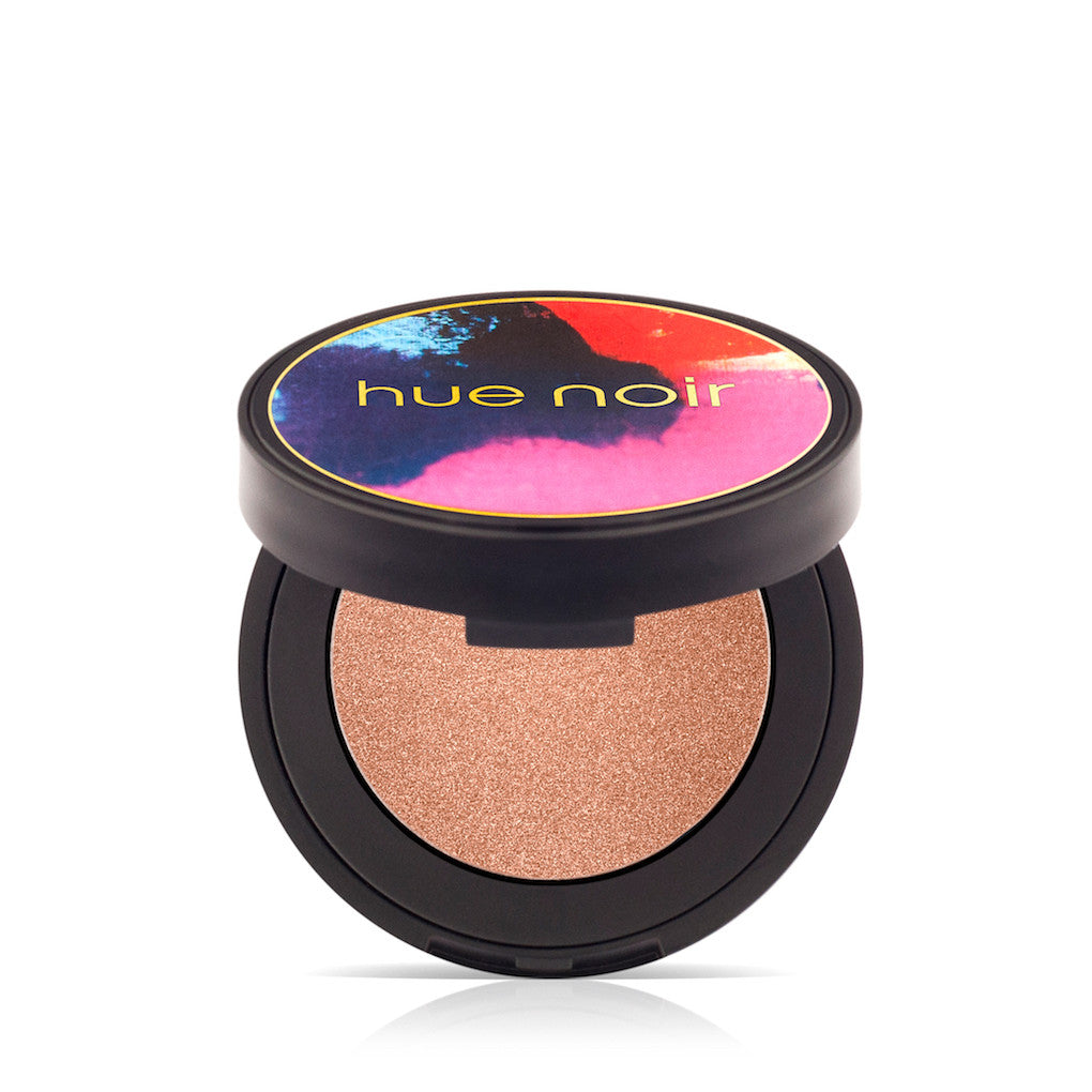 Close- Up of a Hue Noir Purple Eye Shadow Compact, Highlighting its Vibrant Color For Eye Makeup Expert.