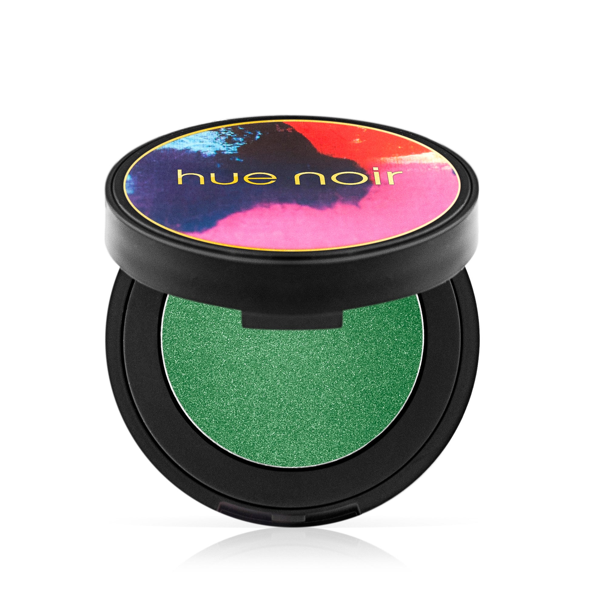 Hue Noir Perfect Pigment Velvet Eyeshadow in Haute Hunter, an open compact with a shimmery green shade inside.