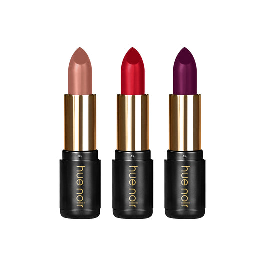 Set of three lipsticks in nude, red, and purple-mauve colors