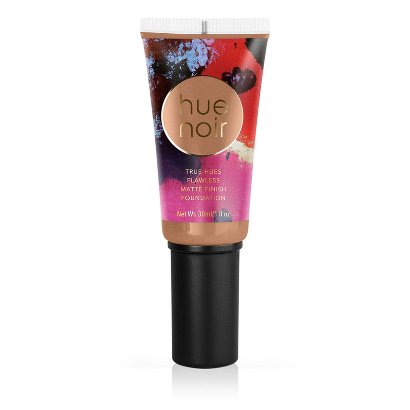 Makeup foundation in tube with pump light medium skin tone shade with warm peach undertones