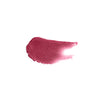 Smear of rose pink tinted lip balm to show color and creamy texture